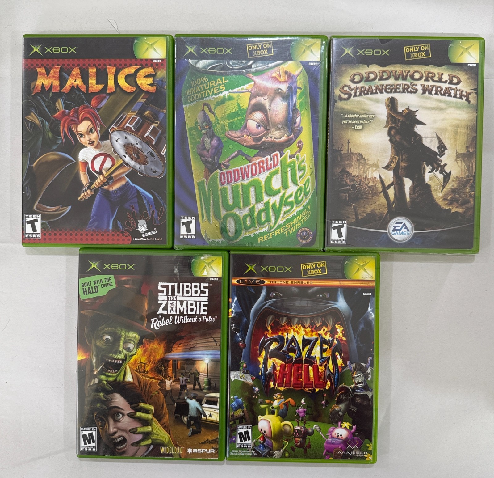 CIB Xbox Games Lot: Stubbs the Zombie, Raze’s Hell, Malice, Oddworld – Working