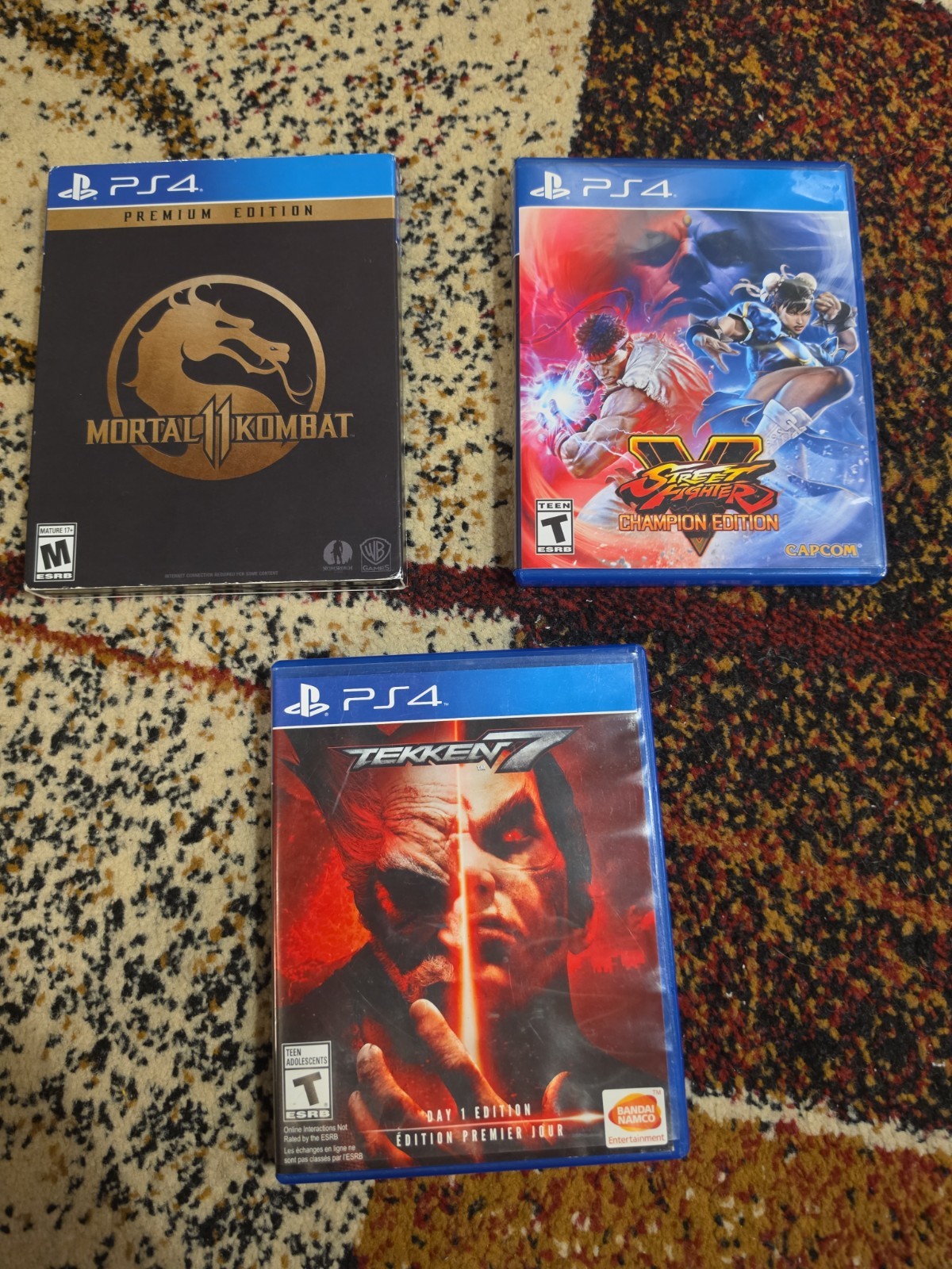PS4 Fighting Game Lot — Mortal Kombat 11 Premium, Street Fighter V CE, Tekken 7