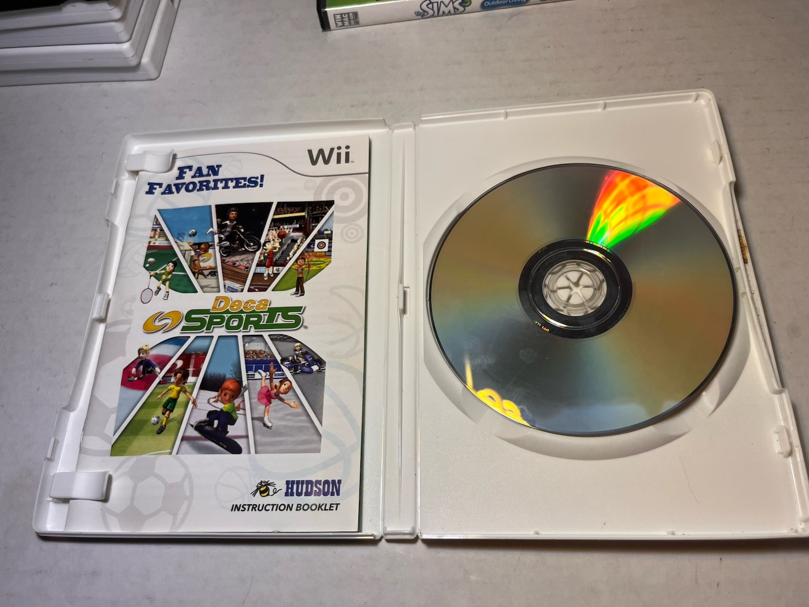 15 Used Wii Games, 2 Aftermarket Controllers Untested
