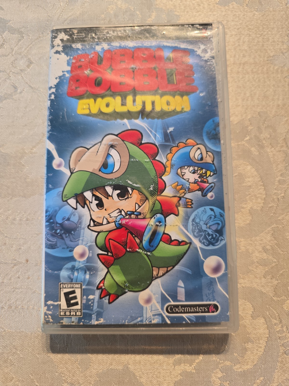 Bubble Bobble Evolution (PSP) CIB, Tested, Slight Damage To Artwork And Manual
