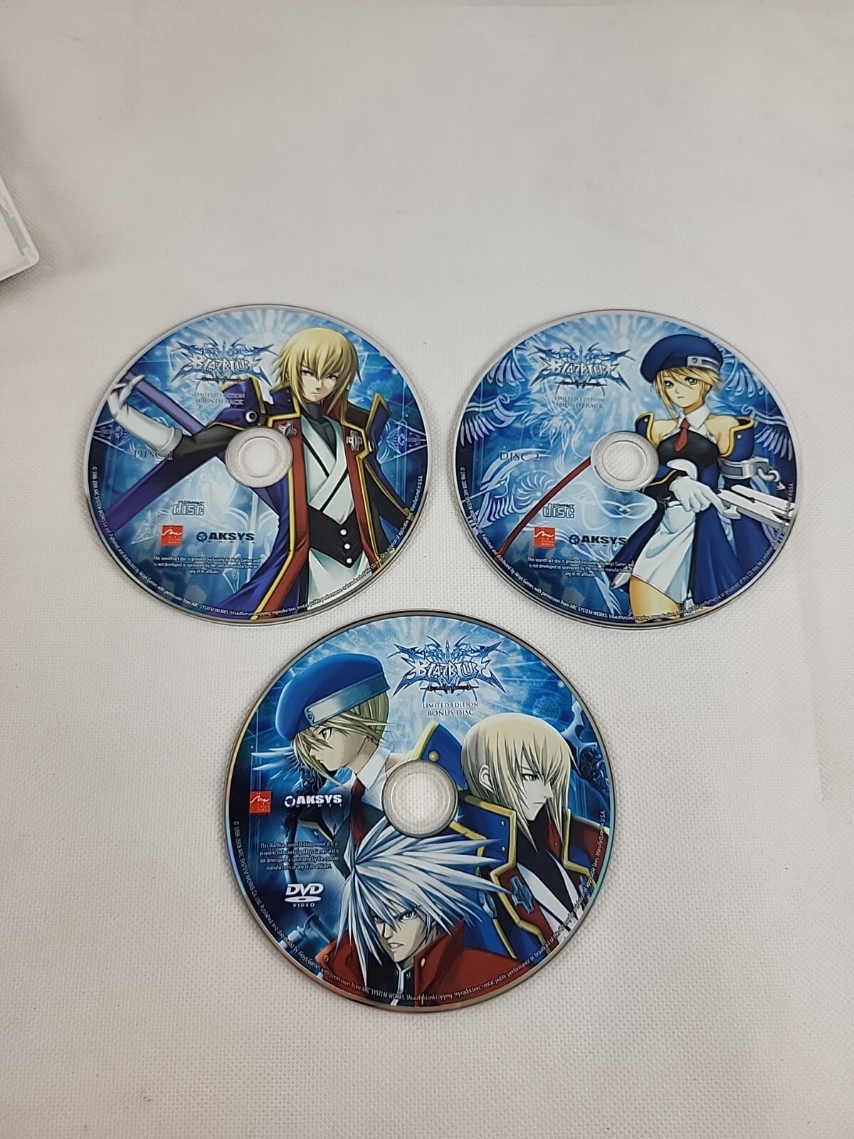 BlazBlue: Calamity Trigger Bonus Discs Arc System Works Aksys 3 Discs 2 CD 1 DVD