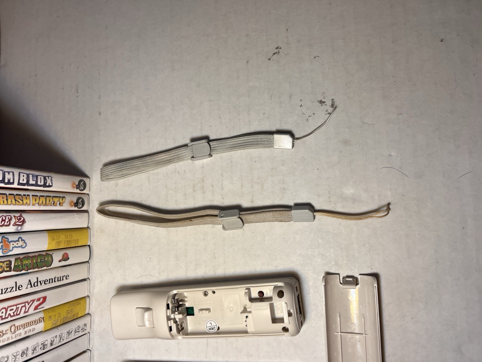 15 Used Wii Games, 2 Aftermarket Controllers Untested