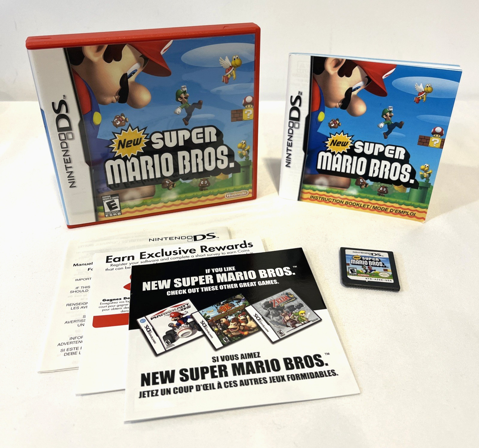 NEW SUPER MARIO BROS. NINTENDO DS COMPLETE W/ RED CASE BOOKLET & INSERTS 2006