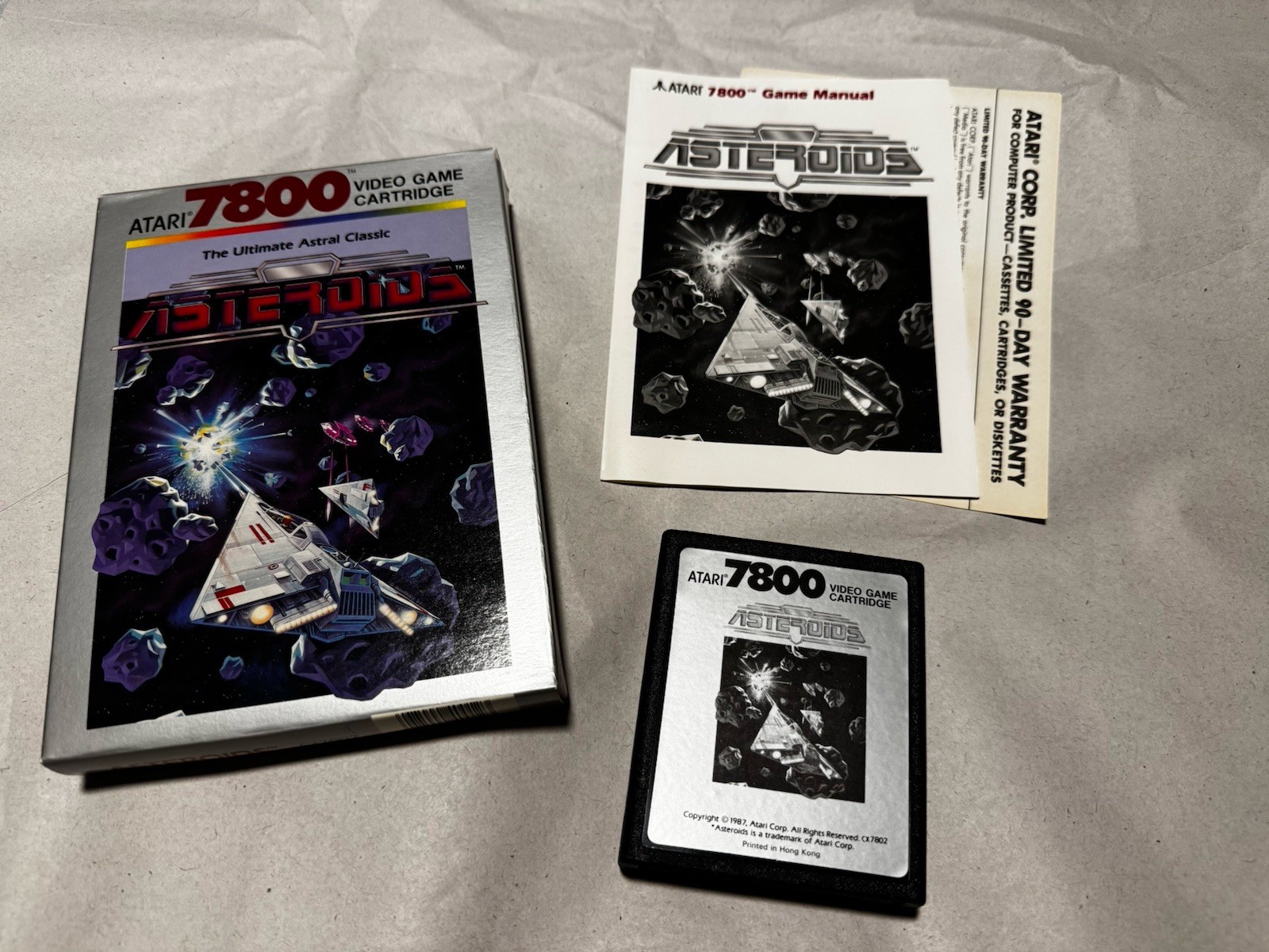 Asteroids (Atari 7800, 1986) Complete CIB Authentic – w/ Manual & Warranty Card