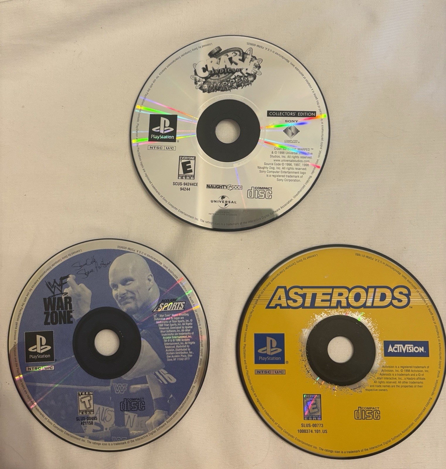 Ps1 Games (Crash Bandicoot Warped, WWF Warzone, Asteroids)