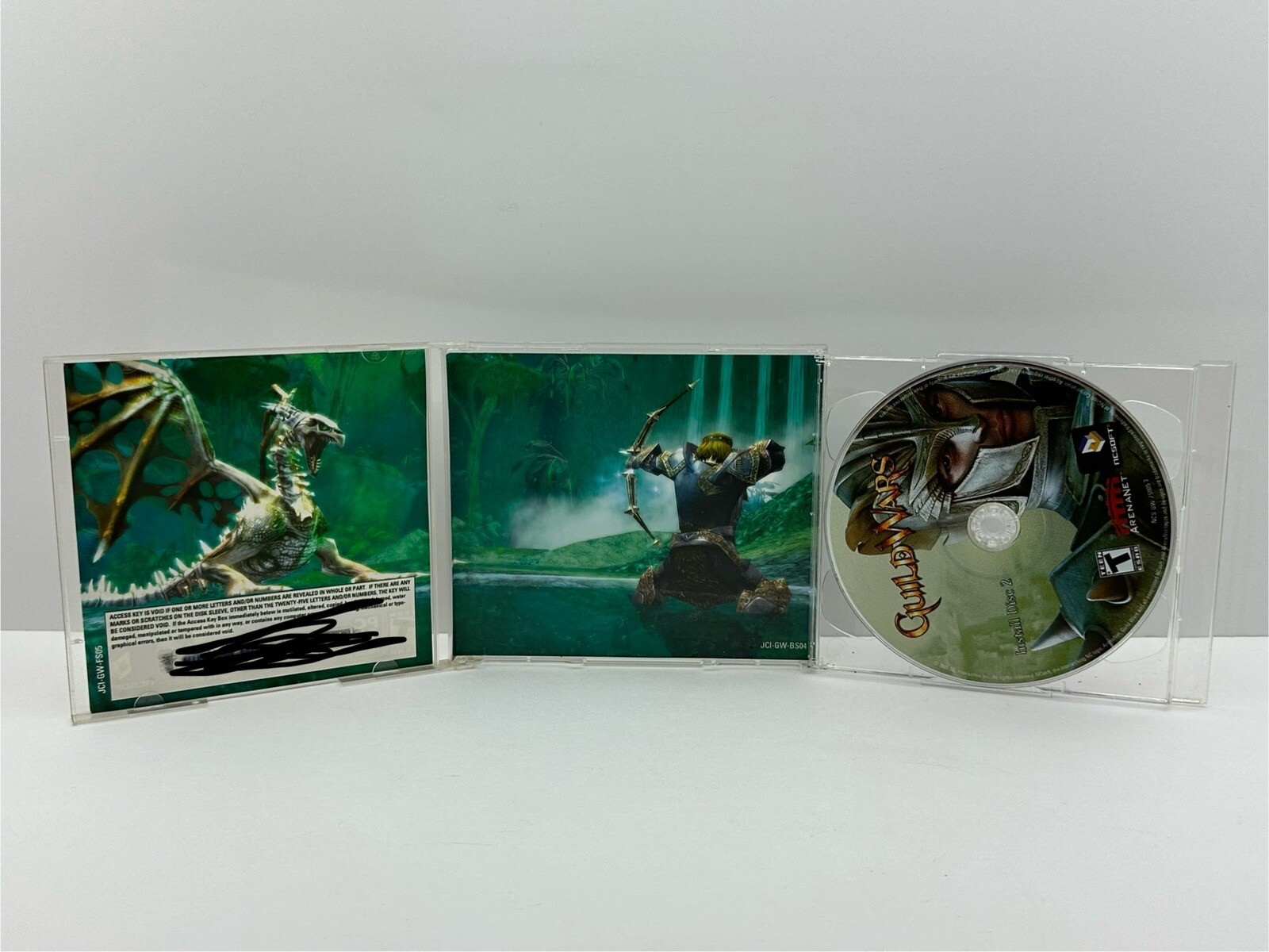 Guild Wars (PC CD ROM, 2005) Complete 2 Discs NCSOFT MMORPG Computer Game