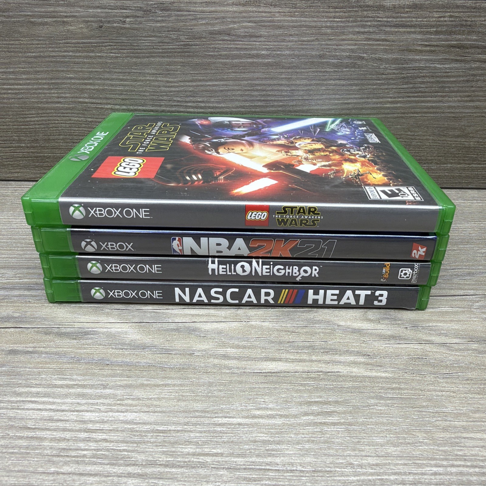 Lot Of 4 Xbox One – Xbox Series Games NASCAR – Hello Neighbor NBA 2k24 Star Wars