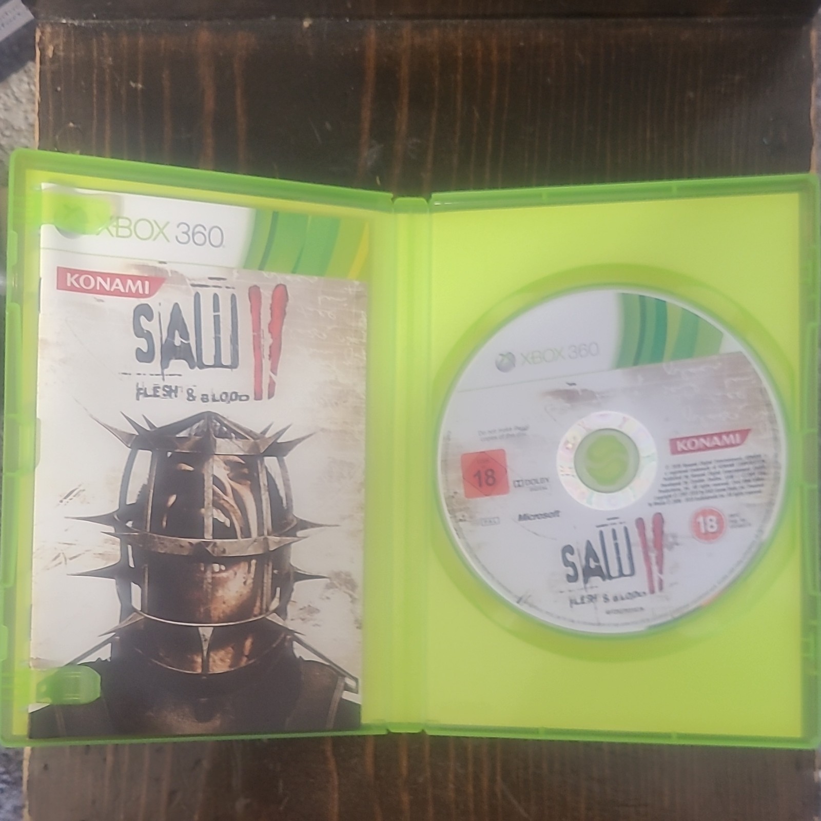 Konami Saw II: Flesh & Blood PAL Manual Included 18 2010 Xbox 360