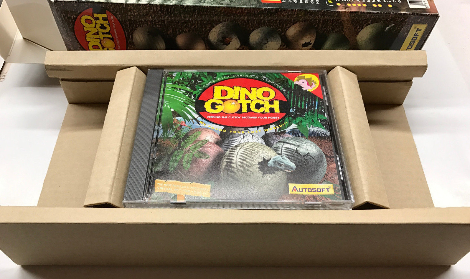 Rare Vintage 1997 CDROM Game DINO GOTCH Virtual Pet Dinosaur Autosoft Win 95 New