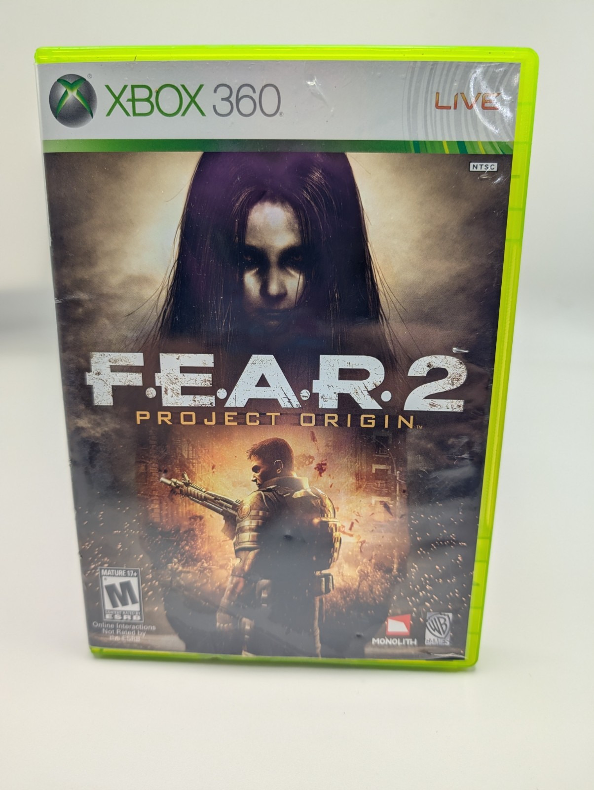 FEAR 2 Project Origin -Xbox 360 – Disc + Inserts – Cracked case shown in photos