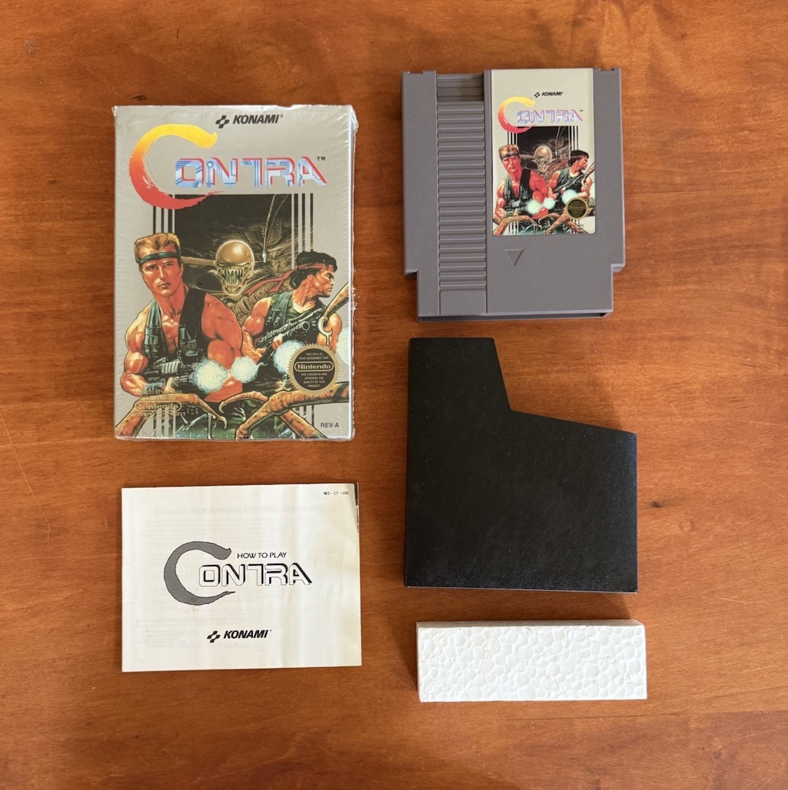 Contra (Nintendo NES) Great Condition CIB Complete w/ Original Plastic Wrap