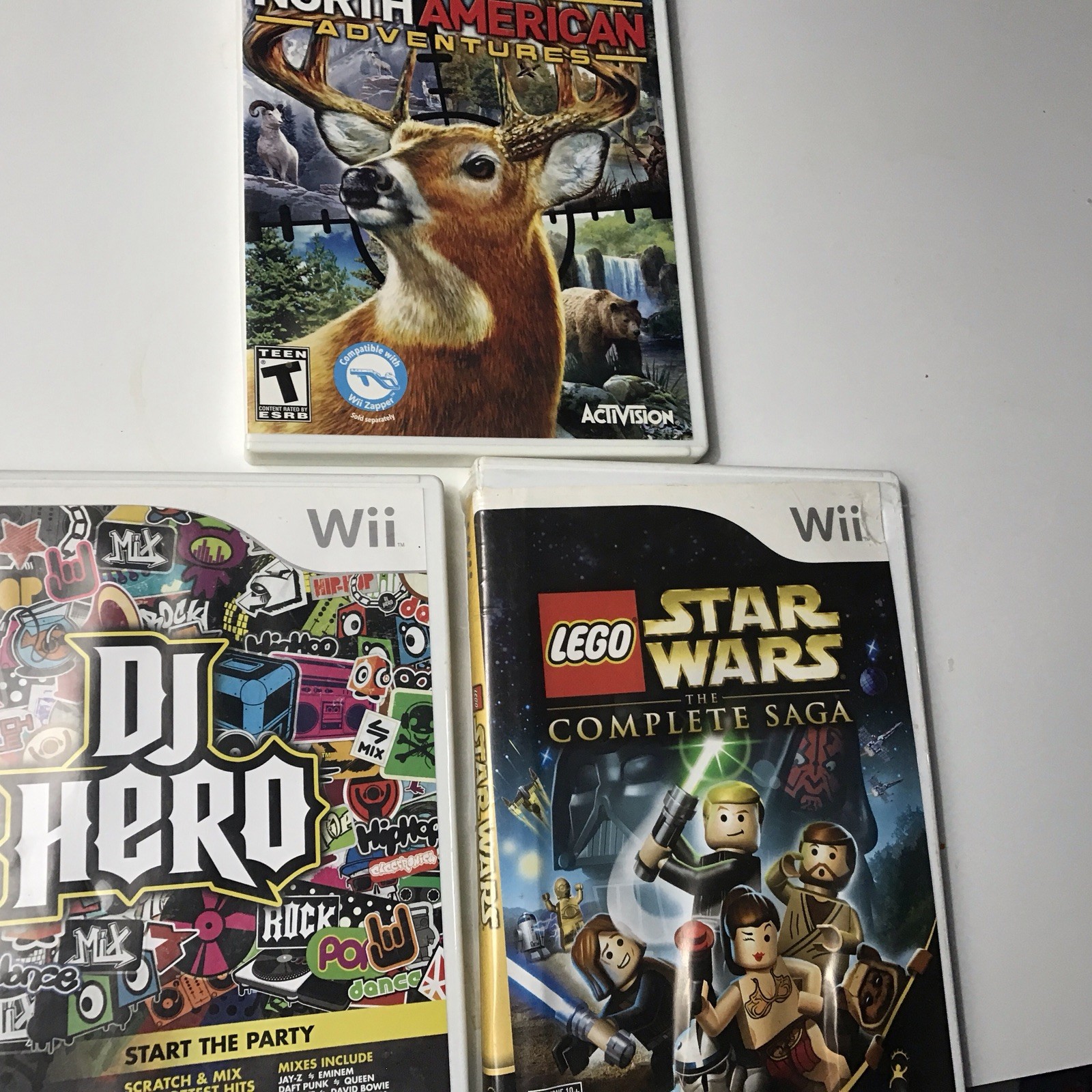 Wii Games: , Star Wars Saga, Cabala’s North America Adventures ,DJ Hero 3 Games