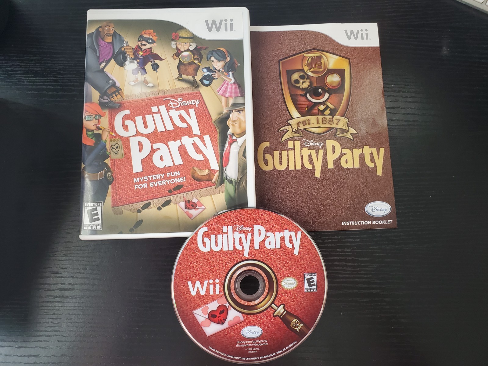 Disney Guilty Party (Nintendo Wii, 2010) COMPLETE disk/case/manual