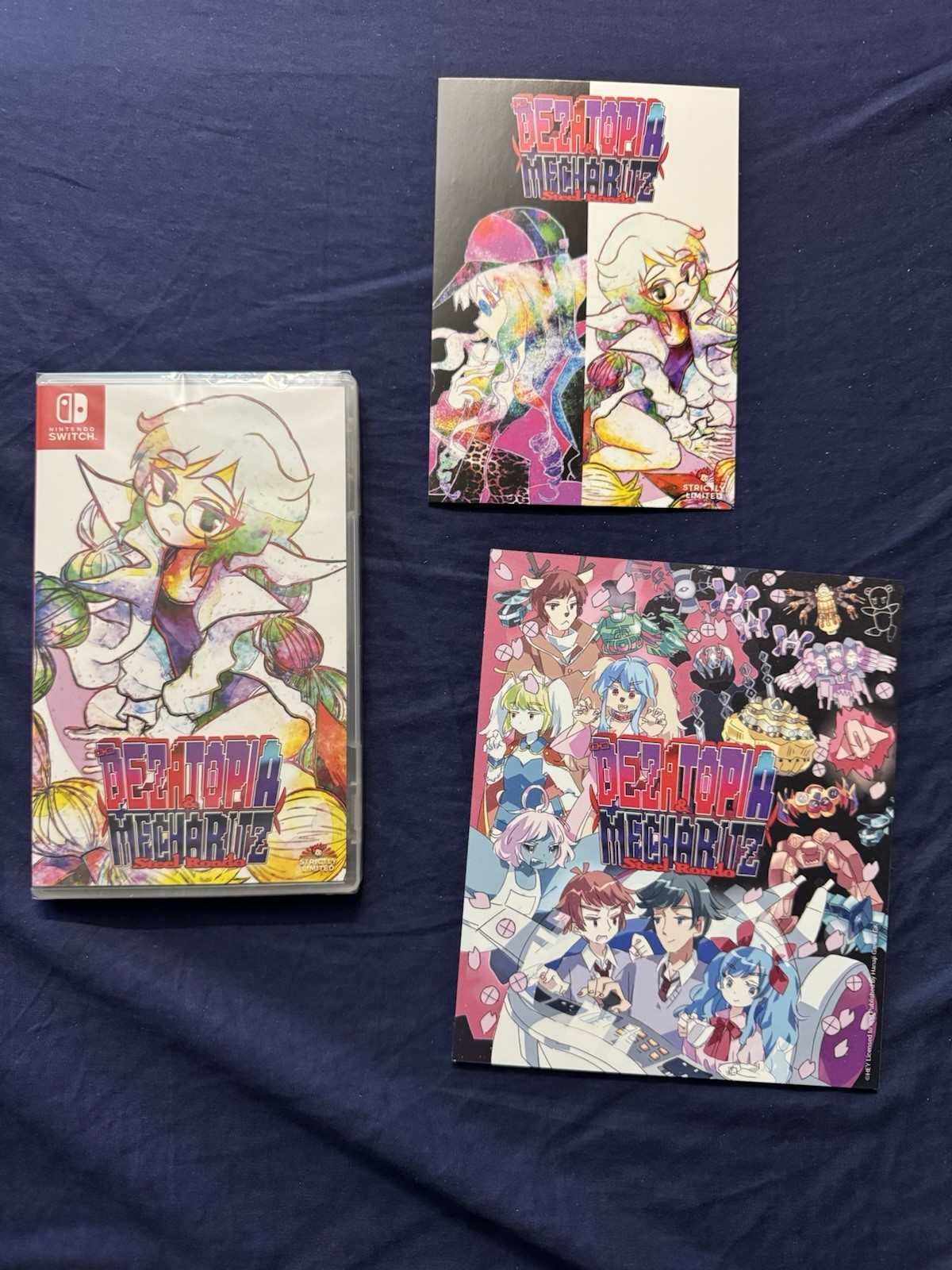 Dezatopia & Mecha Ritz (Switch) – With ART PLATE & POSTCARD FACTORY SEALED NEW