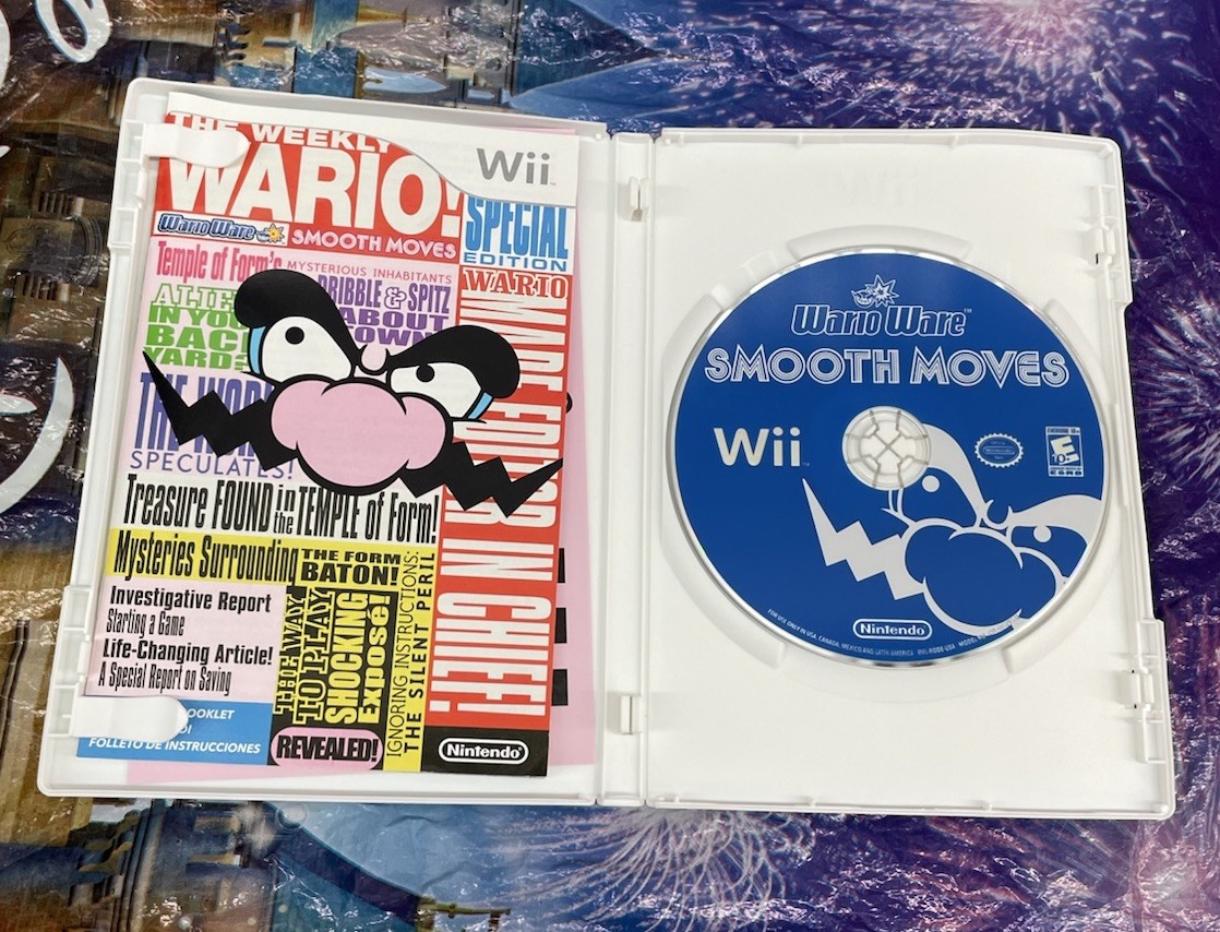 Nintendo WarioWare: Smooth Moves Nintendo Wii E10+ NTSC-U/C 2006 Complete Manual