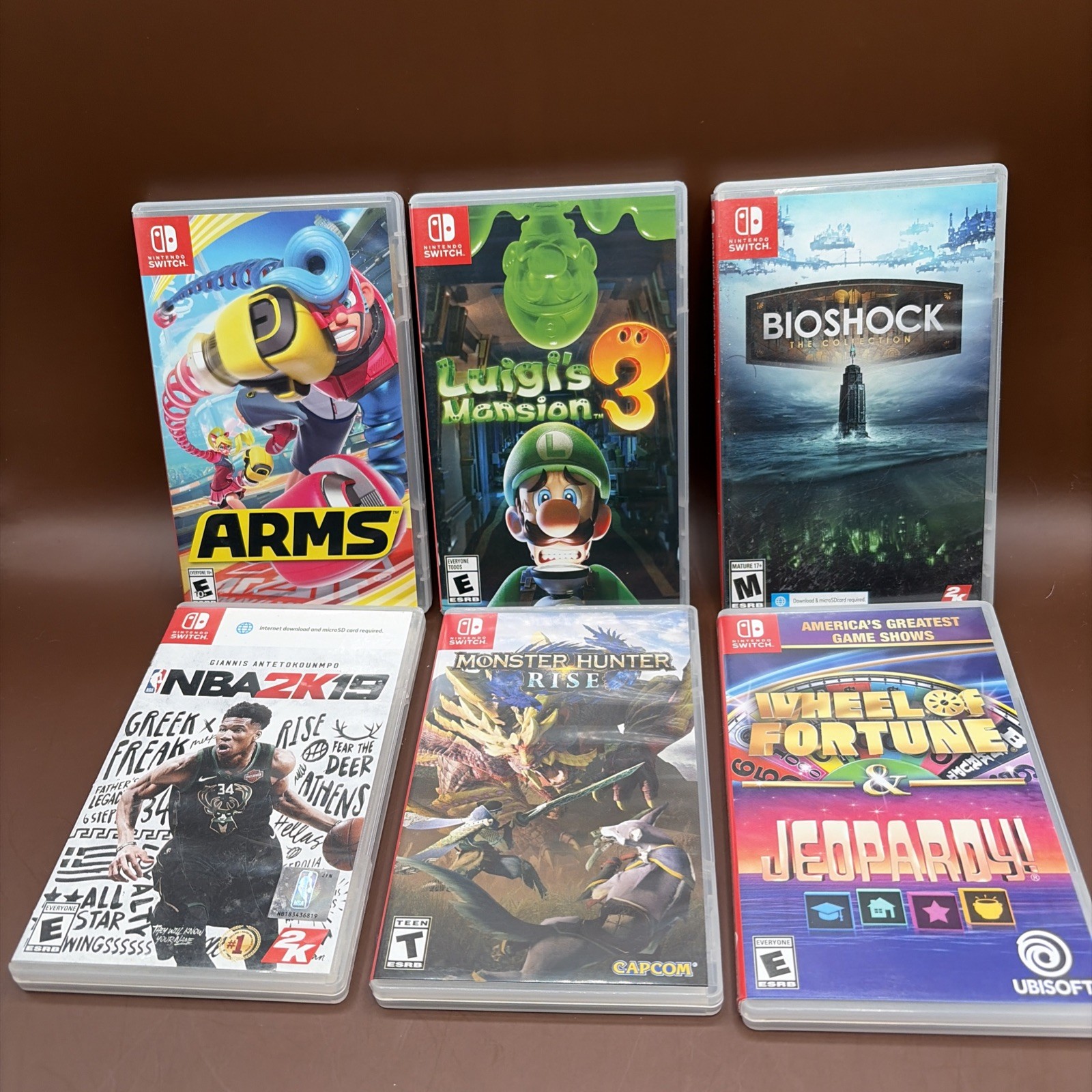 Bundle: Luigi’s Mansion 3 ARMS BIOSHOCK Monster Hunter Rise Nintendo Switch GOOD