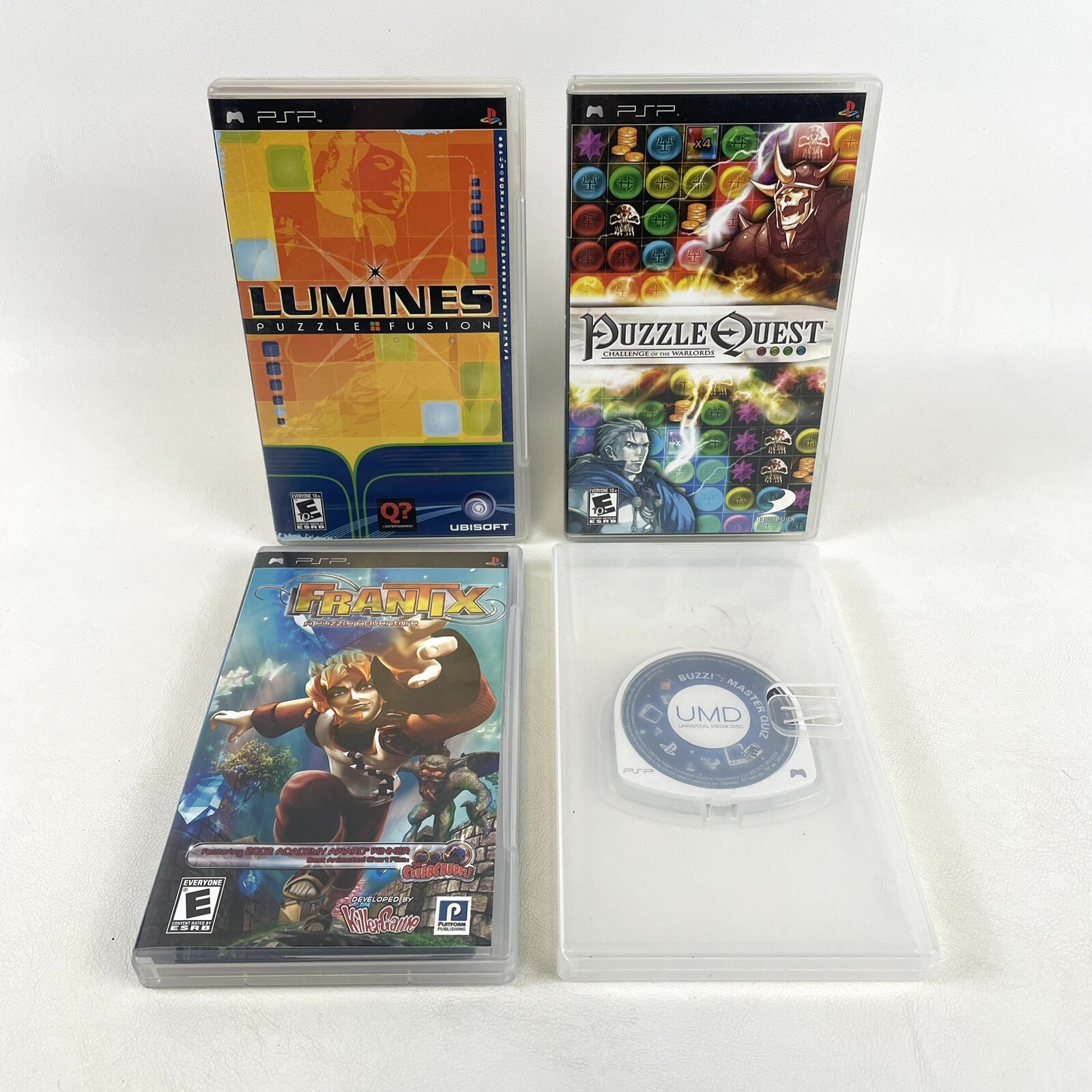 Lot Of 4 Puzzle Quiz PSP Games — Frantix, Lumines, Puzzle Quest & Buzz Quiz!