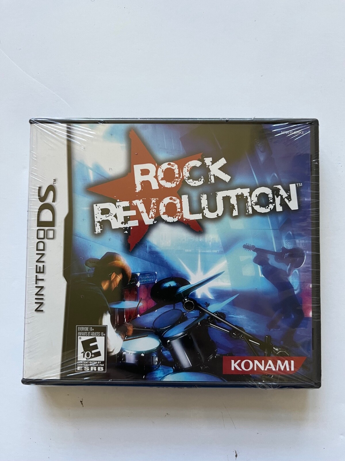 Rock Revolution (Nintendo DS, 2008) New Factory Sealed OOP Konami Music Rhythm