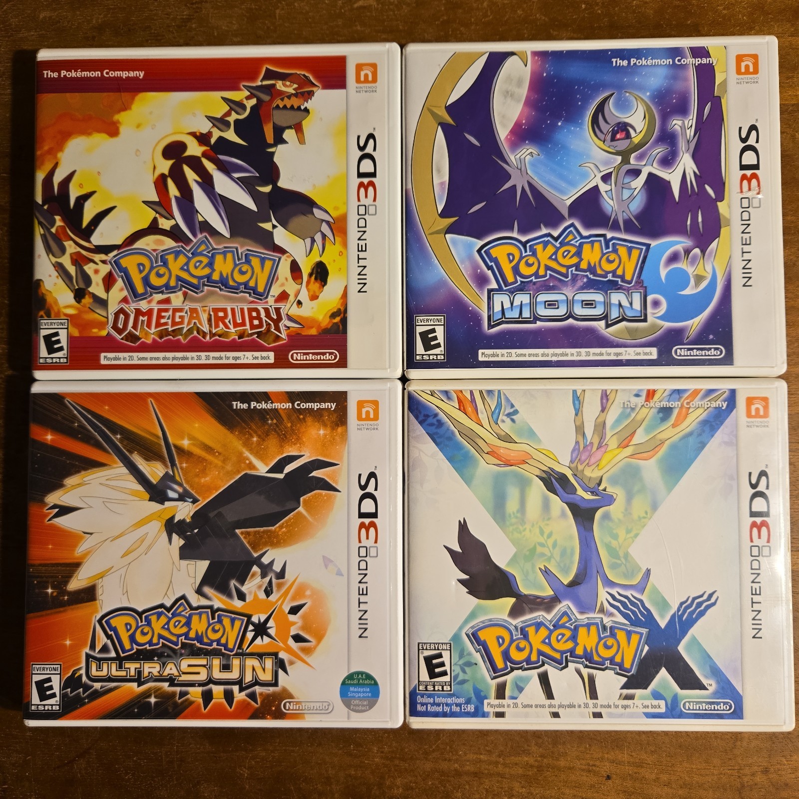 4 Pokemon Game Cases- Ultra Sun, Moon, X, Omega Ruby – No games