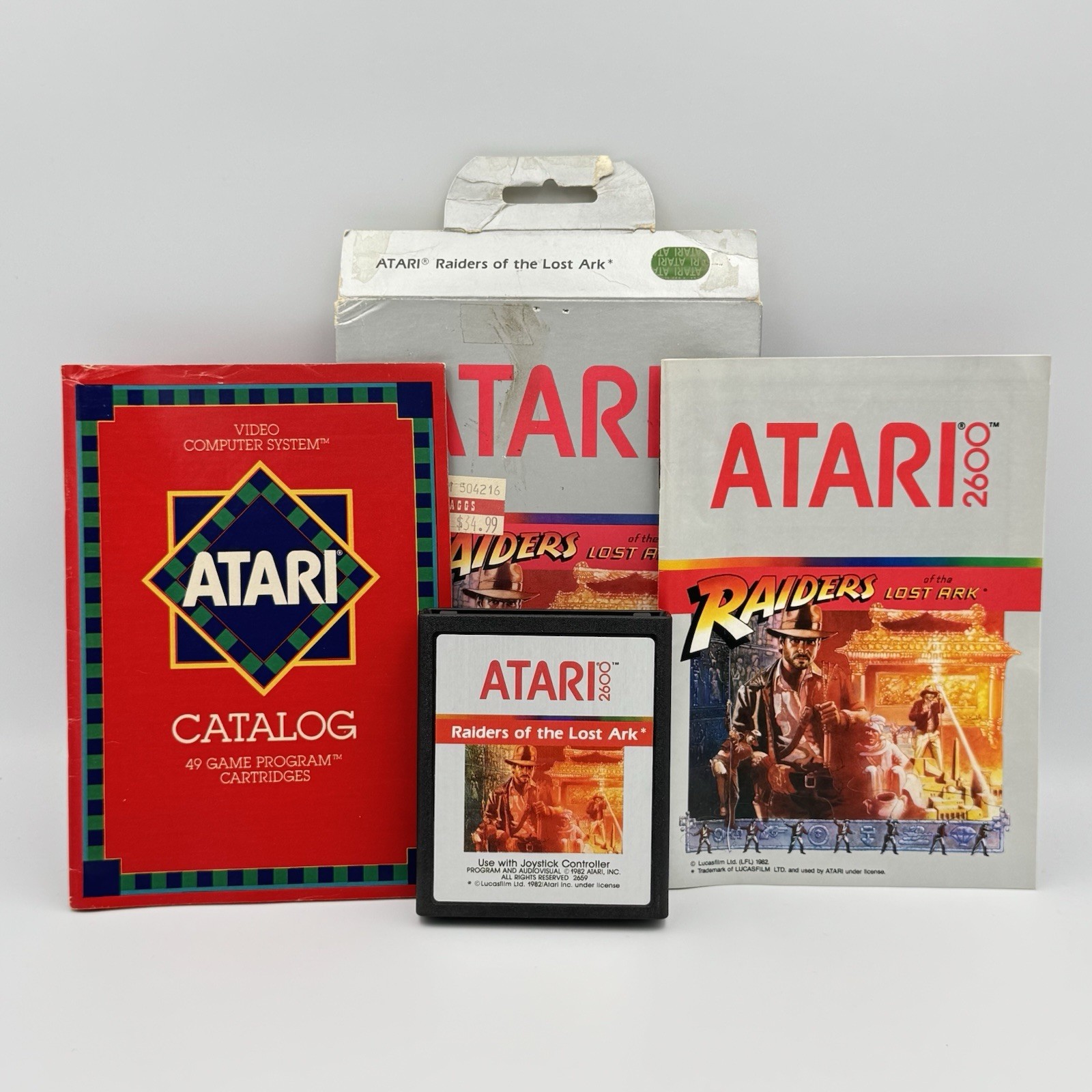 Raiders of the Lost Ark (Atari 2600) CIB Complete with Manual – Tested & Working