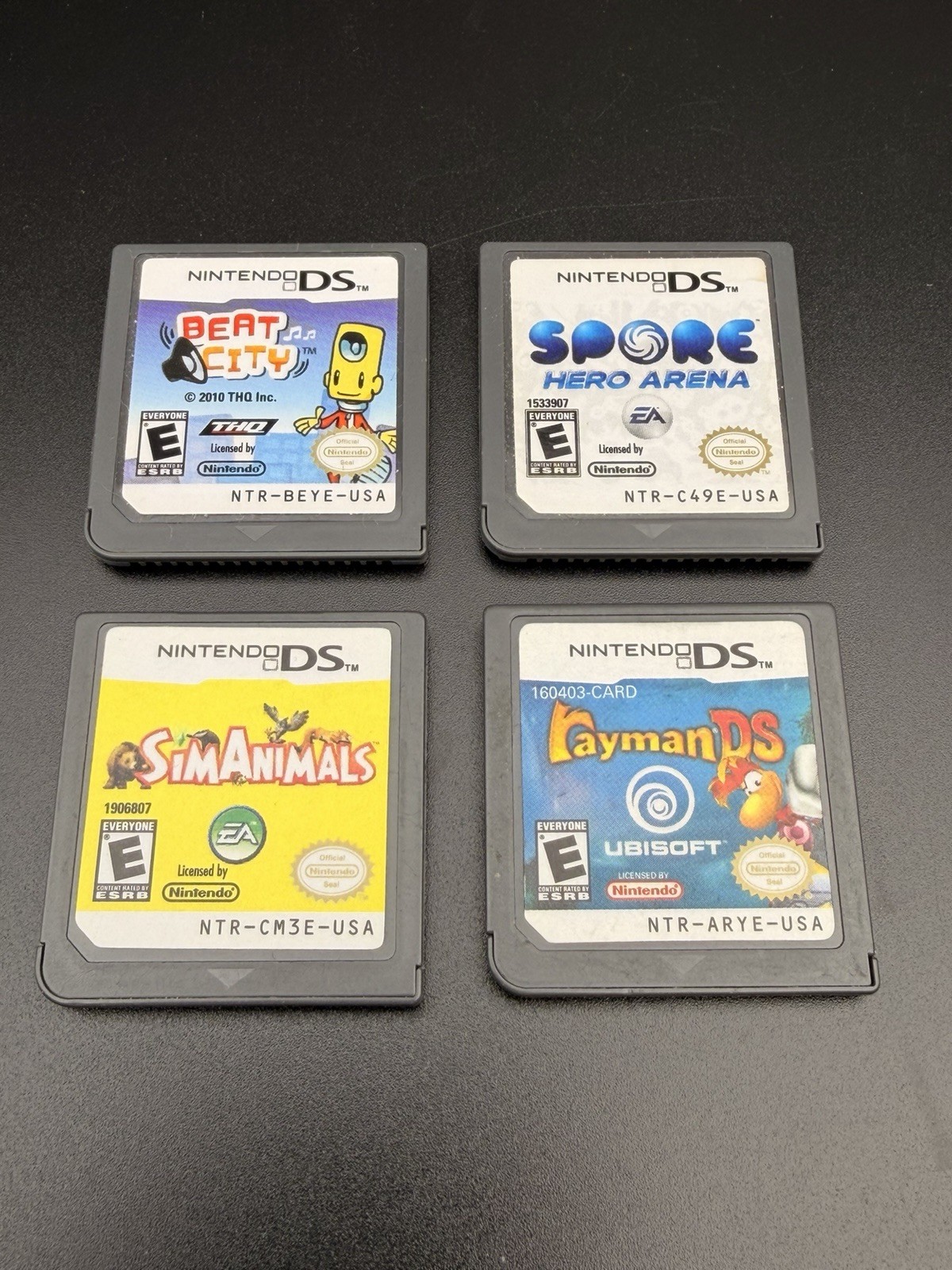 Nintendo DS Game Lot 4: Rayman, Beat City, Sim Animals, Spore Hero Arena