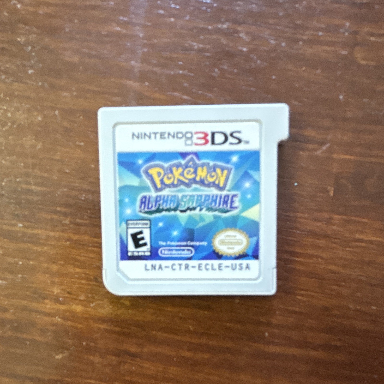 Nintendo 3DS Pokémon Alpha Sapphire with case and cartridge