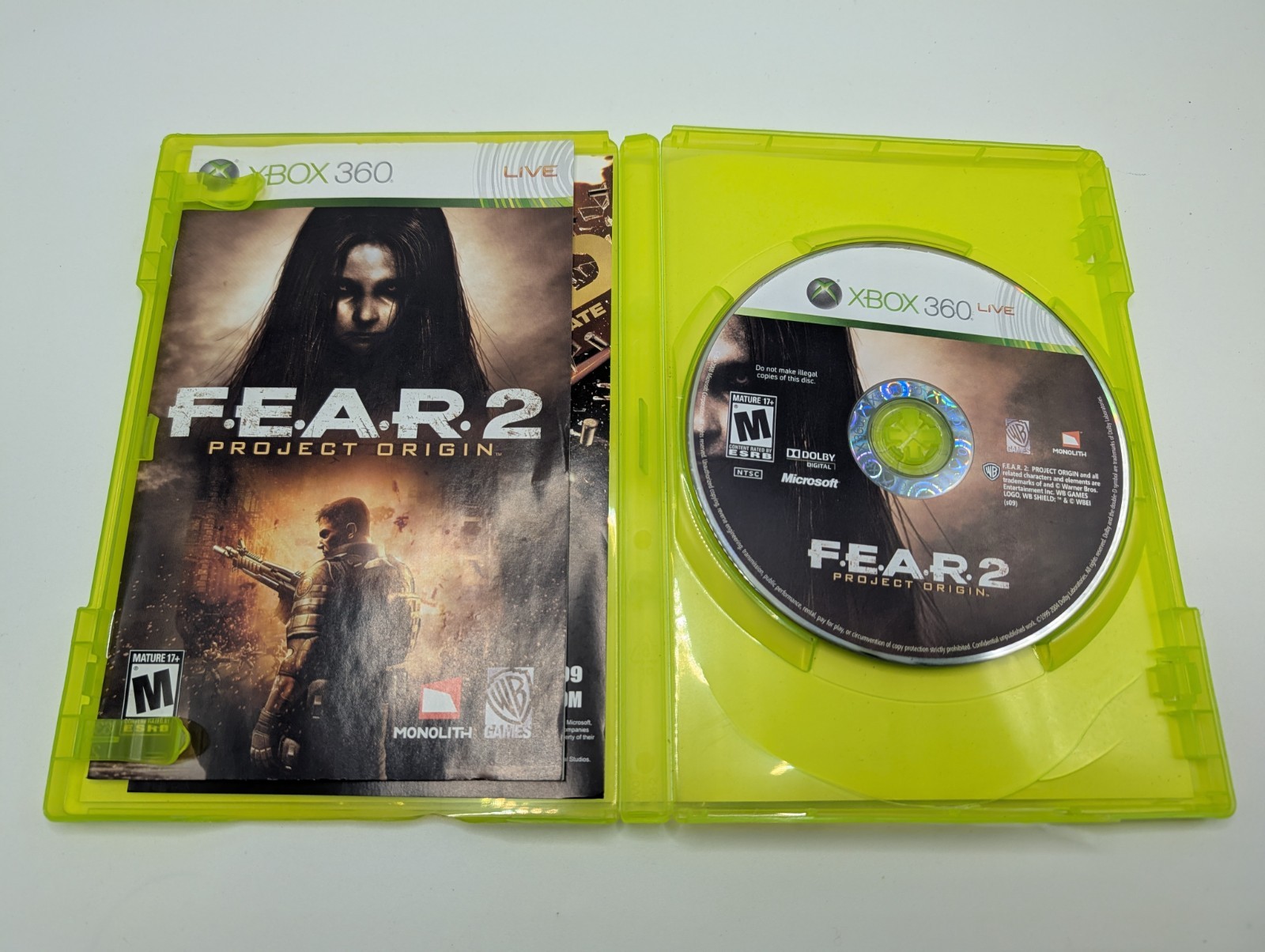 FEAR 2 Project Origin -Xbox 360 – Disc + Inserts – Cracked case shown in photos