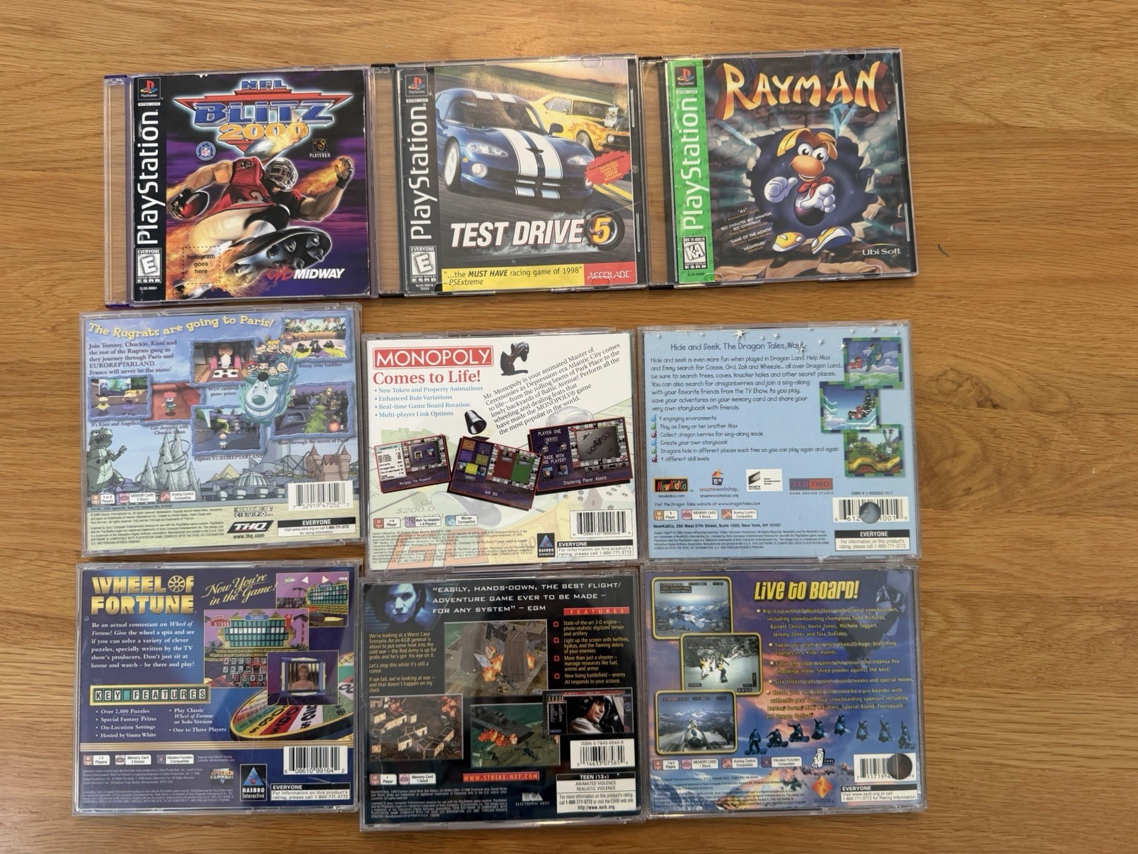 PlayStation 1 Bundle 9 CLASSIC Games. NFL Blitz Rayman Rugrats TESTED! READ DESC
