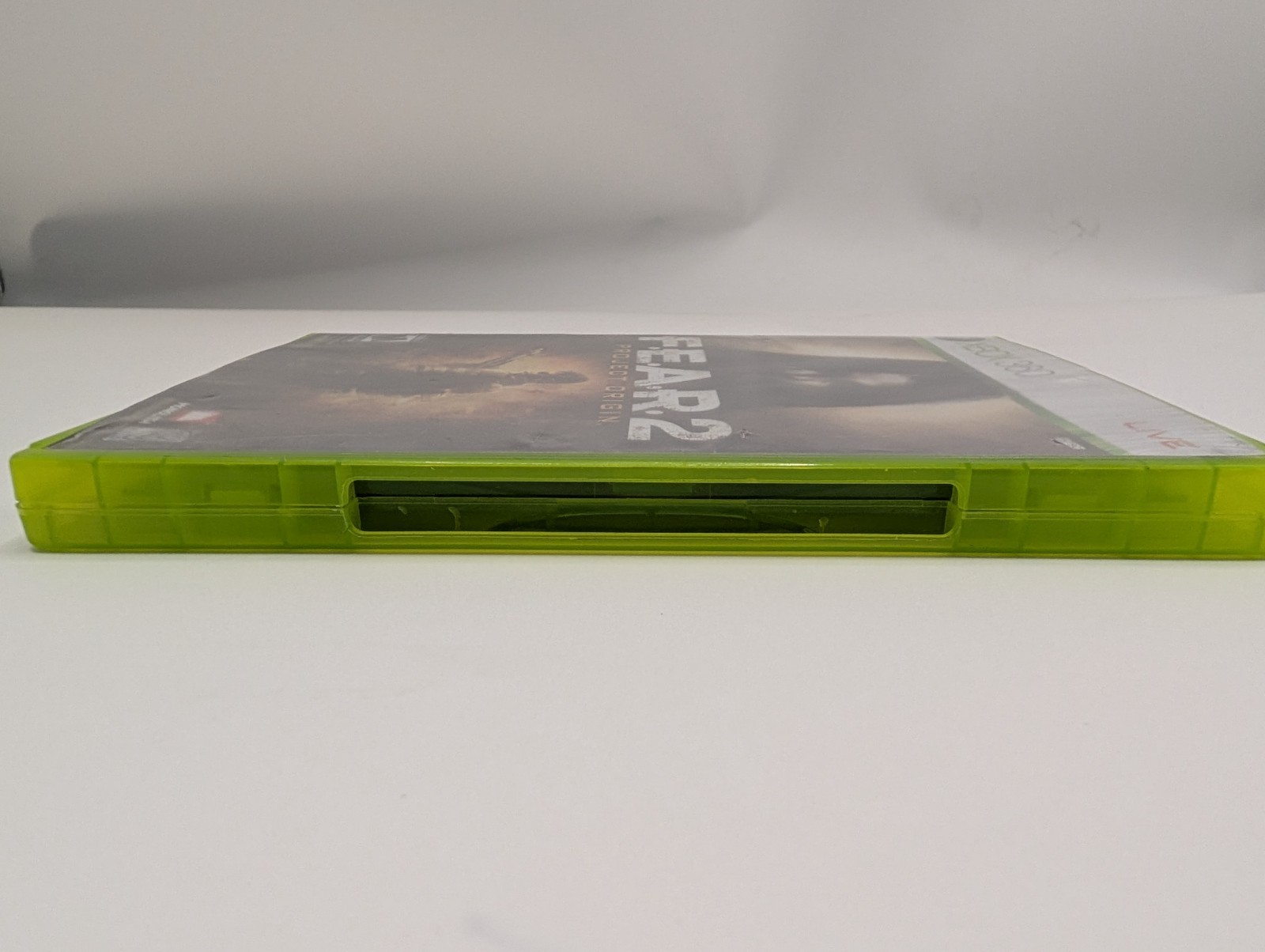 FEAR 2 Project Origin -Xbox 360 – Disc + Inserts – Cracked case shown in photos