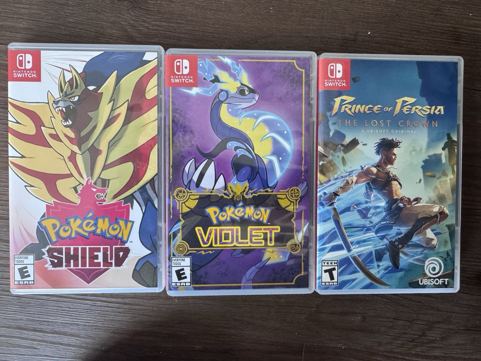 PRE-OWNED W/ CASES | Pokémon Violet & Shield, Prince Of Persia: The Lost Crown