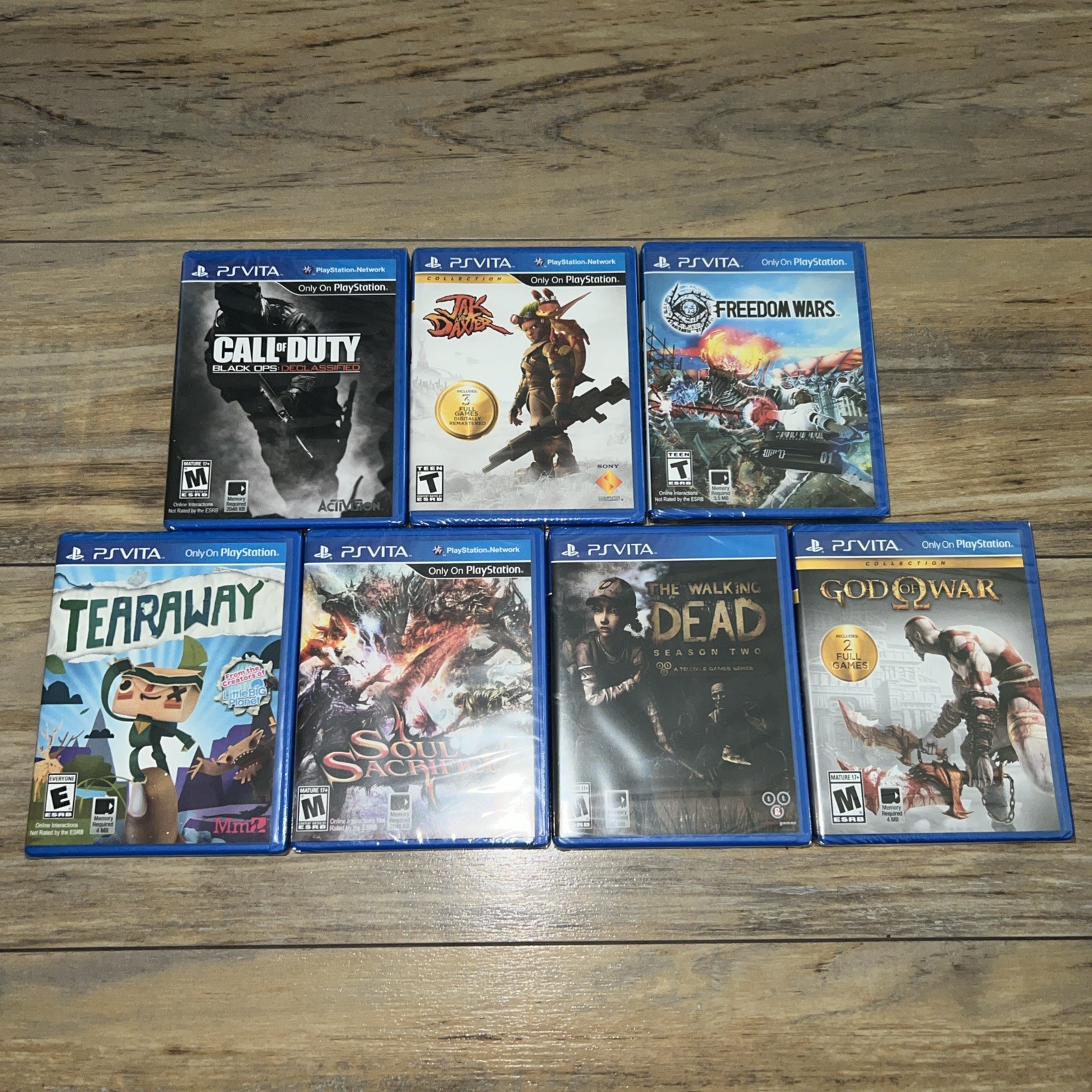 PlayStation Vita Games Lot of 7 ( God of War, Tearaway, Walking Dead, COD, Jak)