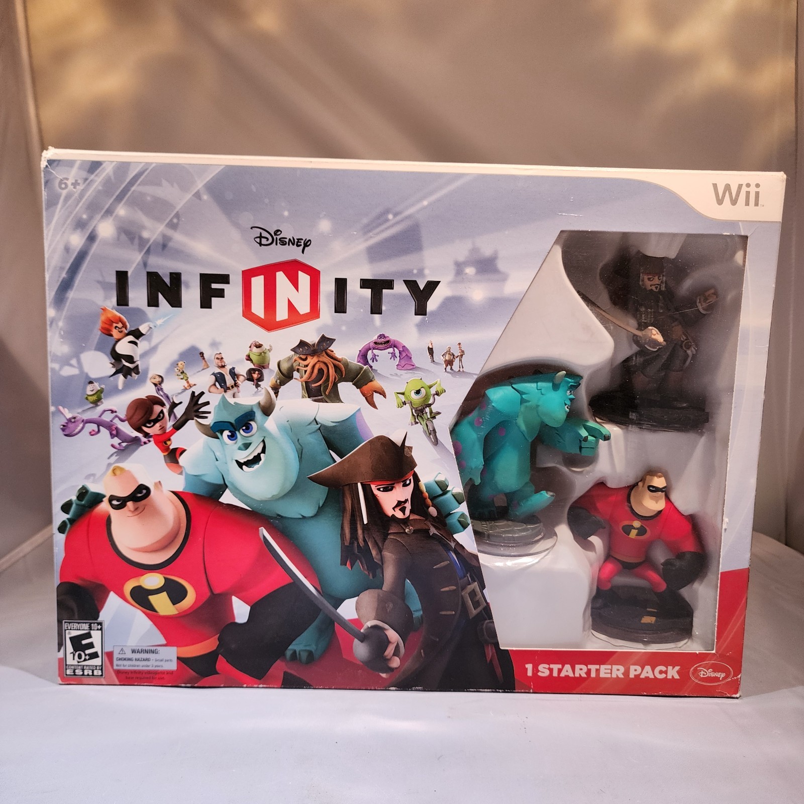 Disney Infinity Starter Pack For Nintendo Wii. Open Box Sealed Game and Pad