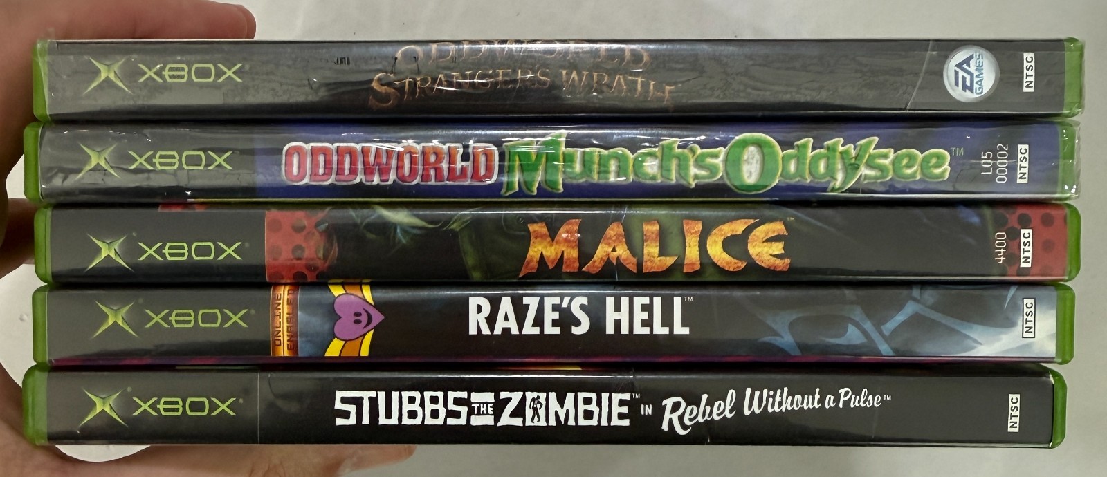 CIB Xbox Games Lot: Stubbs the Zombie, Raze’s Hell, Malice, Oddworld – Working