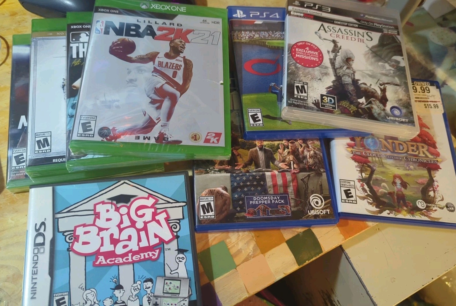 Lot of 9 Mixed Video Games Xbox, PlayStation, and Nintendo