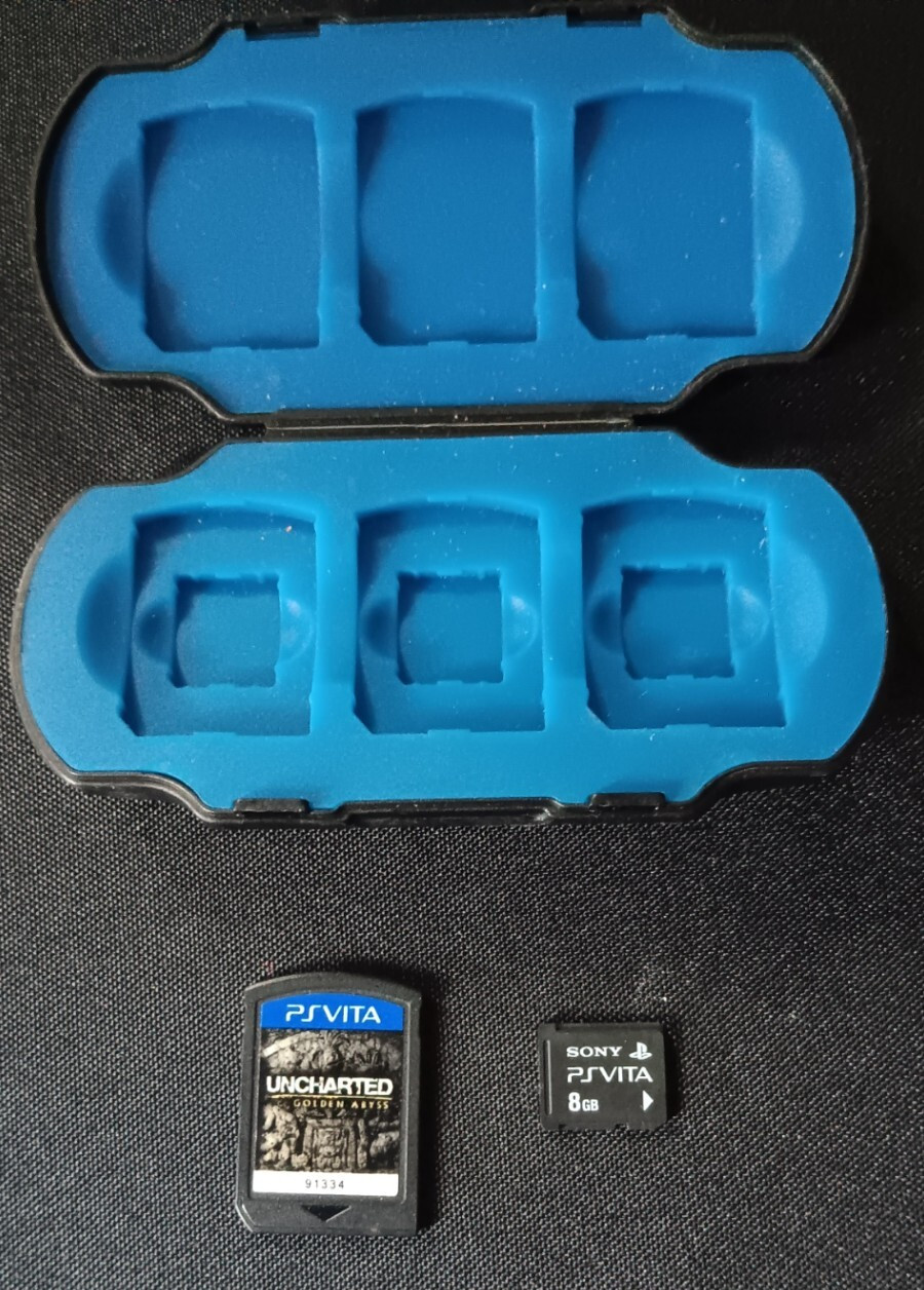 Uncharted: Golden Abyss PlayStation Vita game, 8gb micro SD card, game case