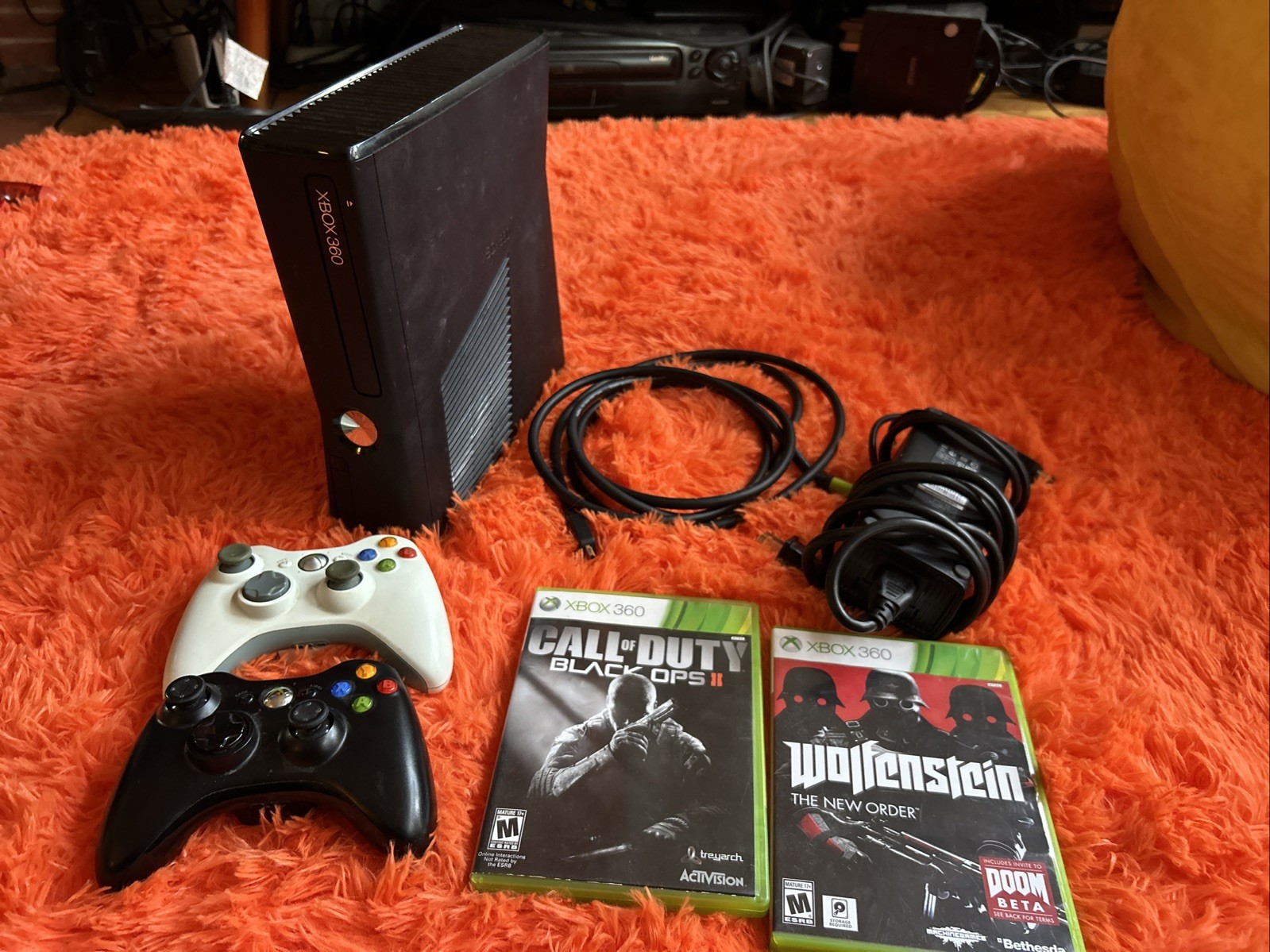 Xbox 360 Slim 4GB With Wolfenstein New Order, Black Ops 2 And Two Controllers