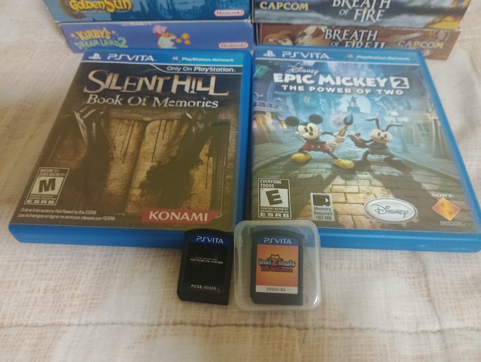 4 vita games: silent hill, invizimals NTSC, epic mickey & spiderman READ