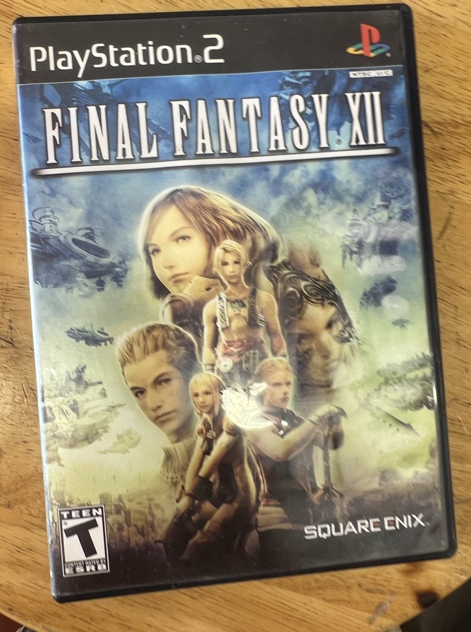 Square Enix Final Fantasy XII 2006 Teen Version Sony PlayStation W/ Book