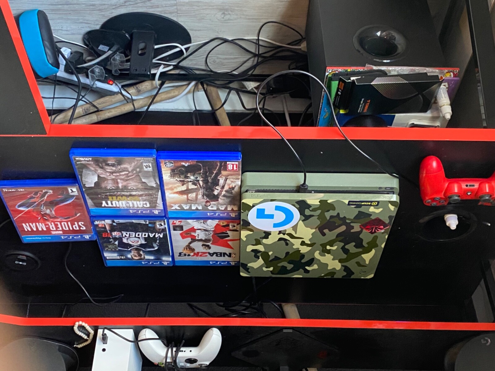 WWII Ps4 consol with controller and 5 video games. Includes 1 TB