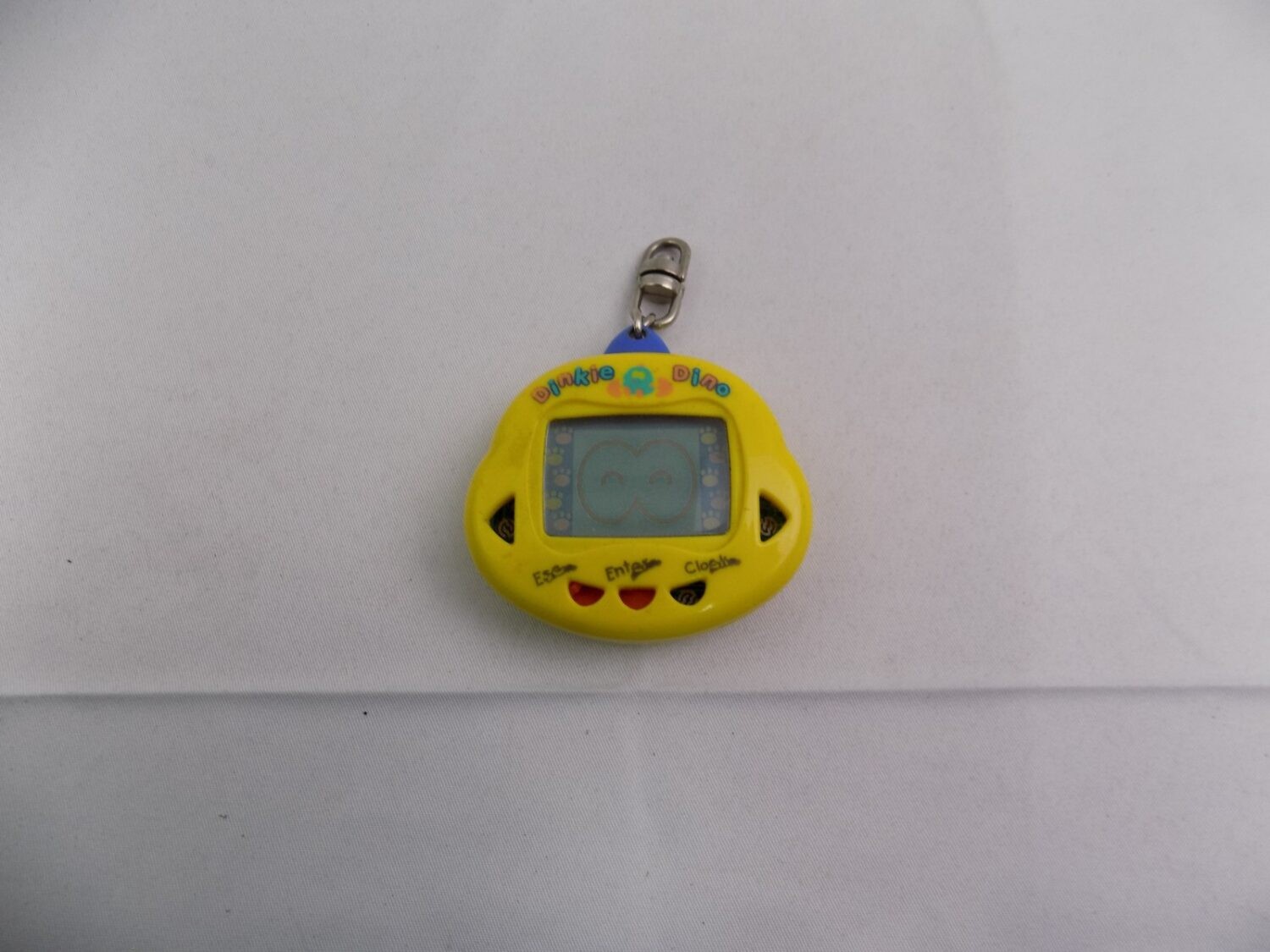 Dinkie Dino Virtual Pet Keychain RakuRaku