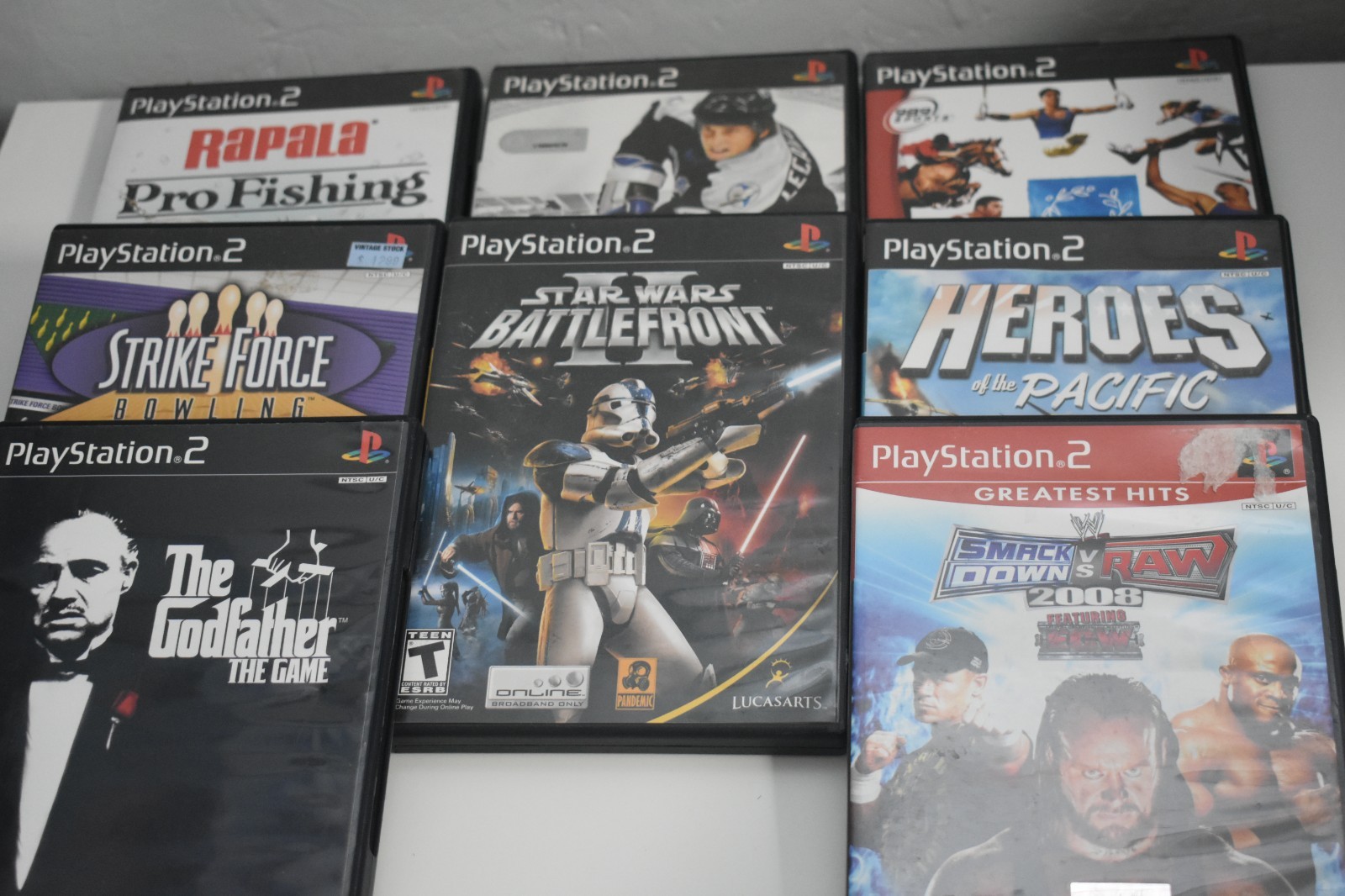 Lot 8 PlayStation 2 PS2 Games mixed Sports, Godfather 2, Star Wars, Wrestling